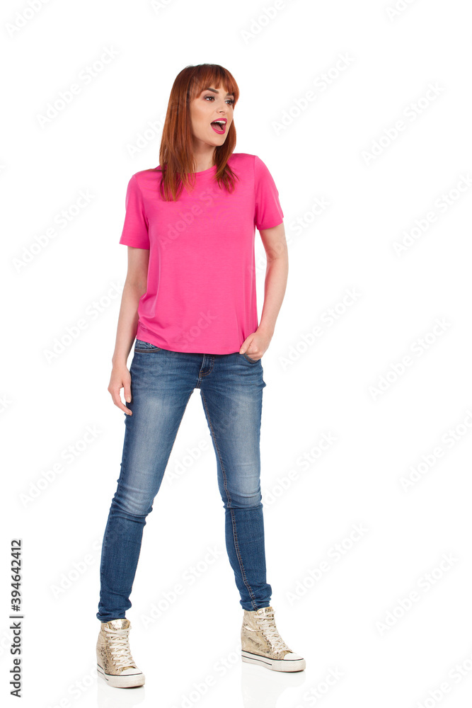 Casual Young Woman In Standing, Looking Away And Shouting Casual Young Woman In Standing, Looking Away And Shouting