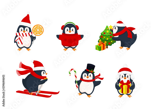 Bundle of adorable cute penguins wearing winter clothing and hats. Active penguins in winter