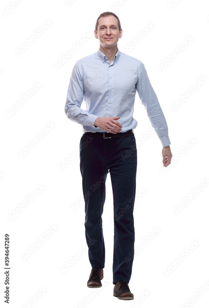 young business man striding forward . isolated on a white young business man striding forward . isolated on a white