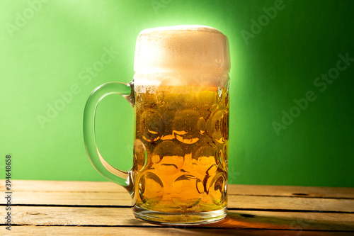beer mug on green background