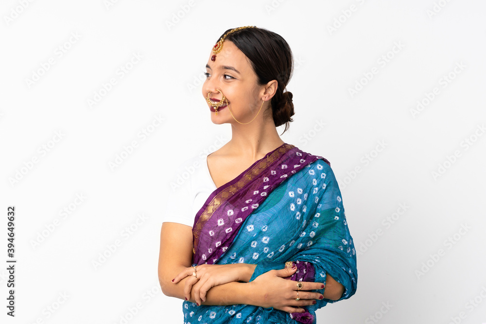 Young indian woman isolated on white background looking side Young indian woman isolated on white background looking side