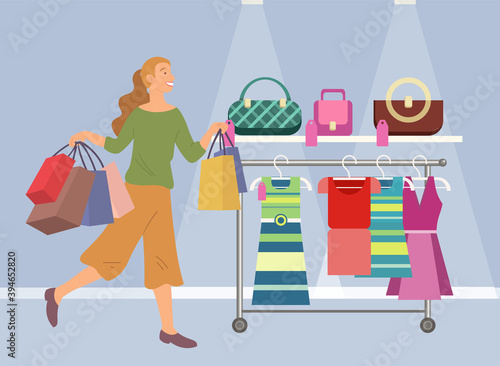 Smiling woman with shopping bags spend time in a mall. Young beautiful happy girl with multi-colored packages with clothes. Female character with purchases choose garment in the boutique store