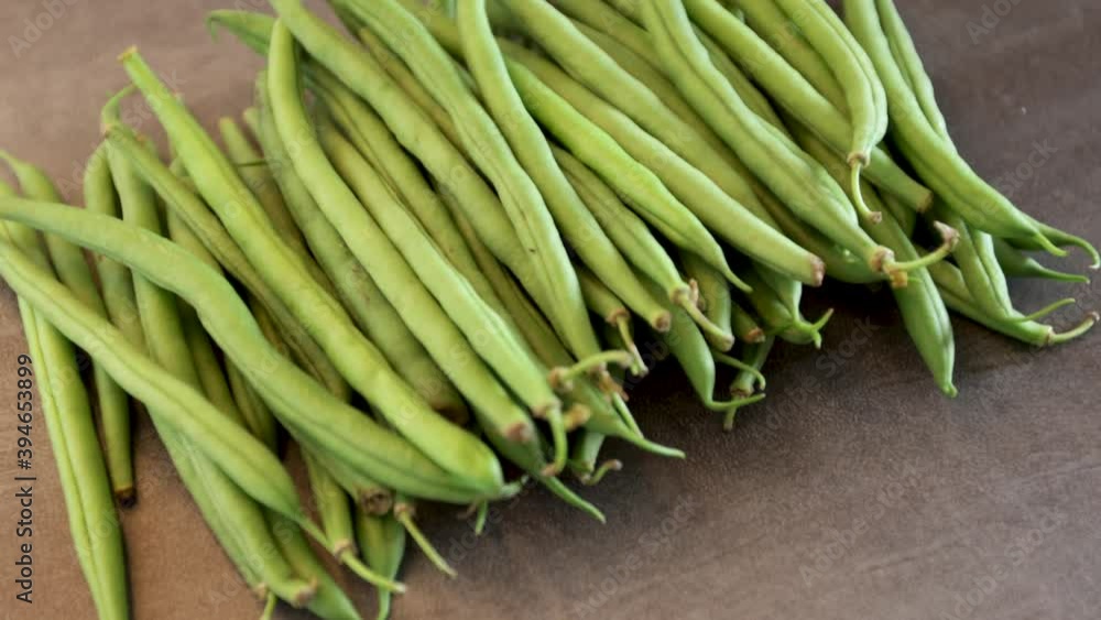 fresh green beans on a gray base fresh green beans on a gray base
