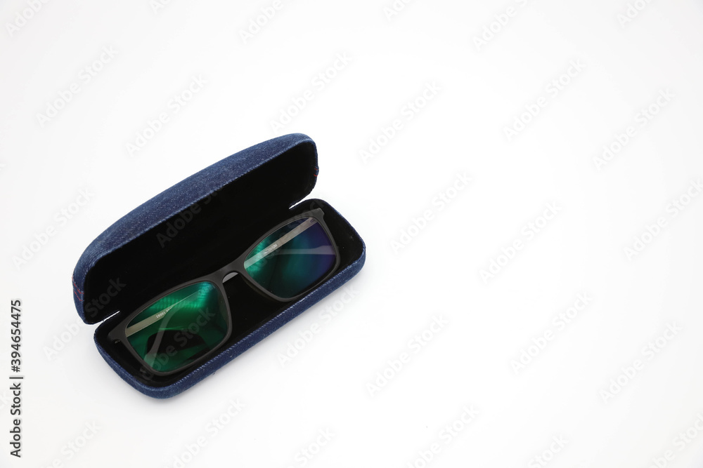 Glasses with beautiful blue boxes waiting to be admired Glasses with beautiful blue boxes waiting to be admired