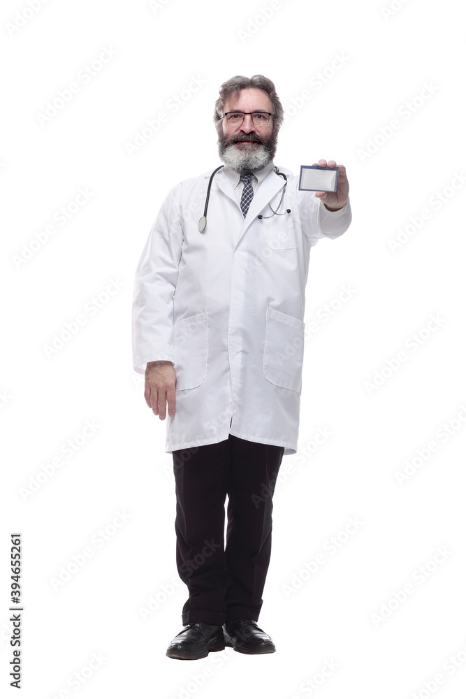 friendly doctor therapist showing his visiting card . isolated on a white