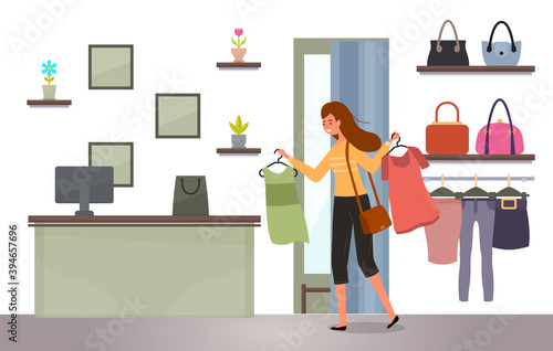 The girl with a hangers with t-shirts in her hands shopping. Buyer is selecting clothes in a store. Young beautiful fashion girl isolated on white background. Woman goes to the checkout with purchases