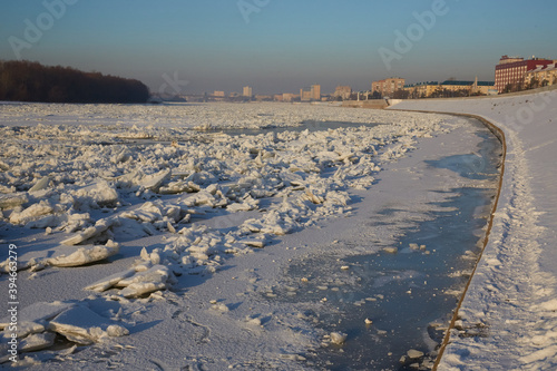 Embankment of the Irtysh river in Omsk in winter, in the evening. Russia.