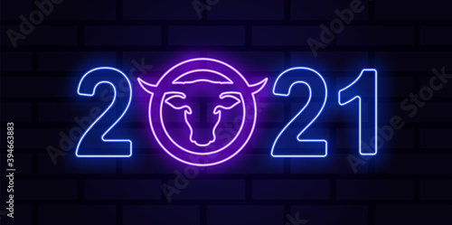 Colored neon illustration bull head, circle, numbers on a brick wall background. Vector illustration for poster, flyer, postcard, sticker. Chinese New Year 2021.