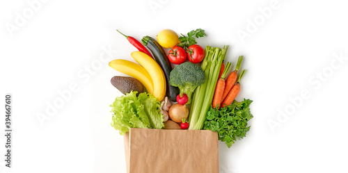 Fototapeta Naklejka Na Ścianę i Meble -  Paper grocery bag full of healthy fresh fruits and vegetables top view isolated on white background