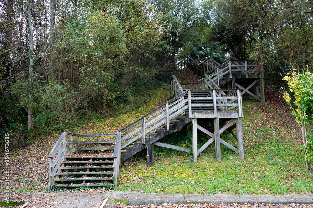 Wooden stairs at autumn