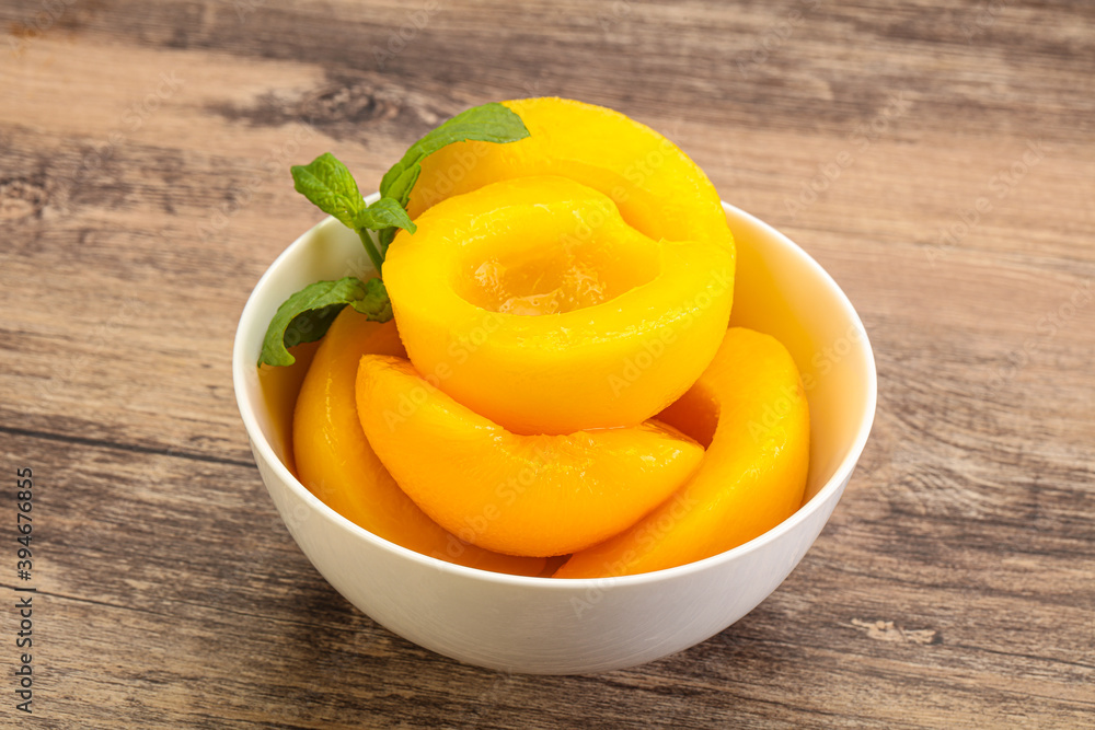 Sweet ripe canned peaches with mint Sweet ripe canned peaches with mint