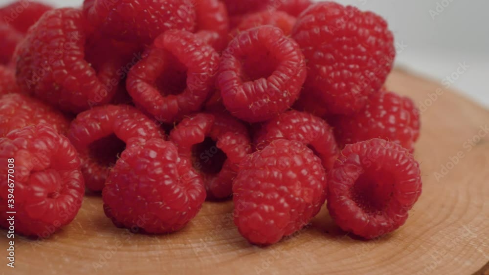group of fresh red raspberry on wood group of fresh red raspberry on wood
