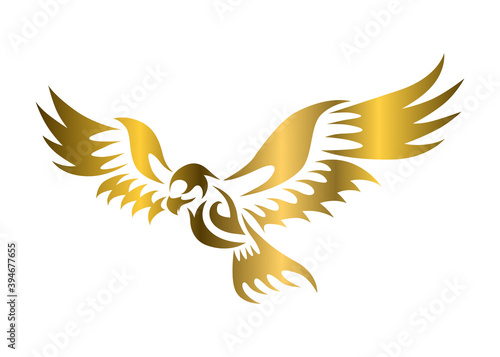 golden vector logo of hawk that is flying.  © Sakarapap