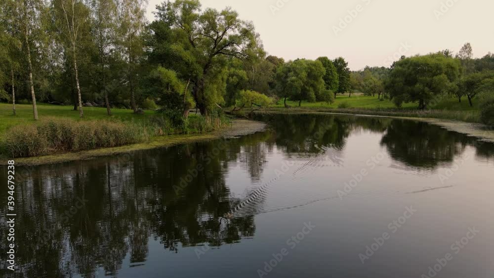 lake sunset sun ray on water motion drone view