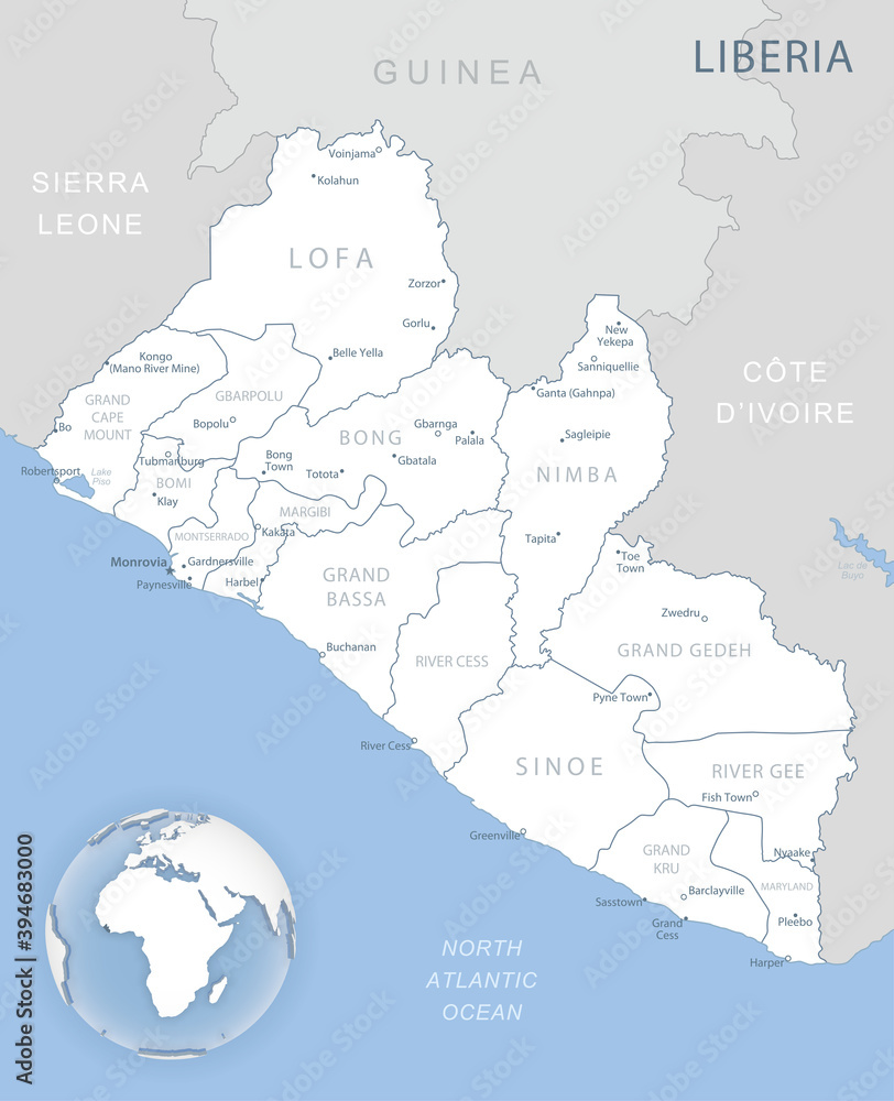 Blue-gray detailed map of Liberia administrative divisions and location on the globe.