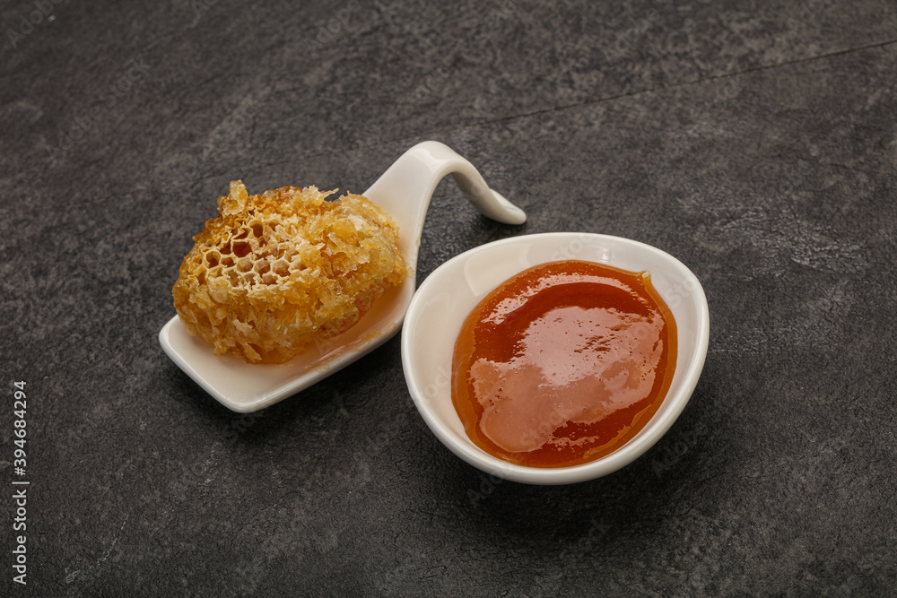 Natural honey in the bowl Natural honey in the bowl
