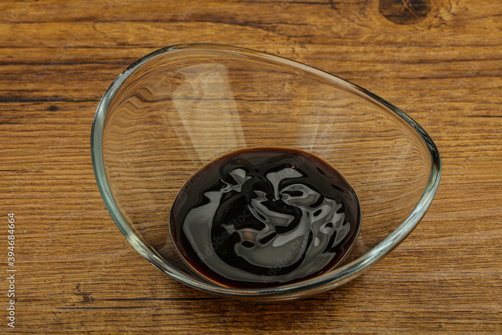 Asian cuisine - oyster sauce in the bowl Asian cuisine - oyster sauce in the bowl