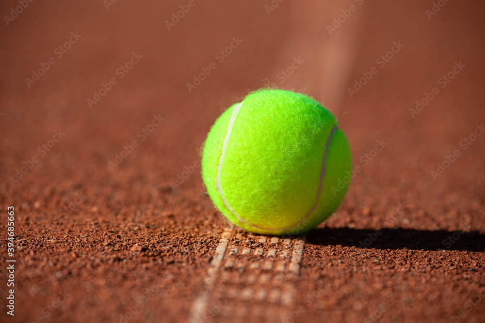 Tennis Ball on the White Line