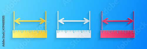 Paper cut The measuring height and length icon isolated on blue background. Ruler, straightedge, scale symbol. Paper art style. Vector.