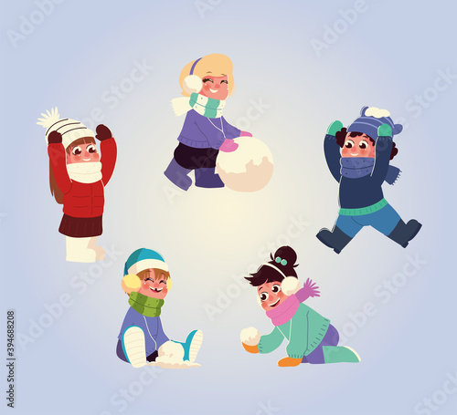 little group kids with winter clothes and snowballs
