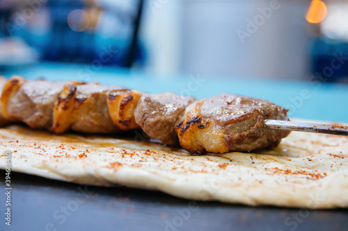Skewers of grilled shish kebab or barbecued shashlik meat. 