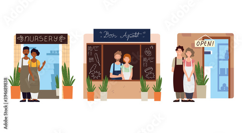 couple owners standing facade their business