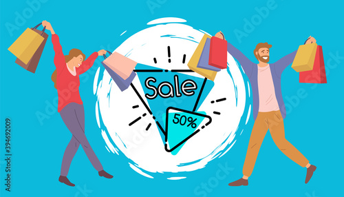 Fifty percent discount announcement on blue background. Couple with shopping bags in their hands. Young beautiful girl picks up multi-colored packages and crosses her legs. People shopping at the sale