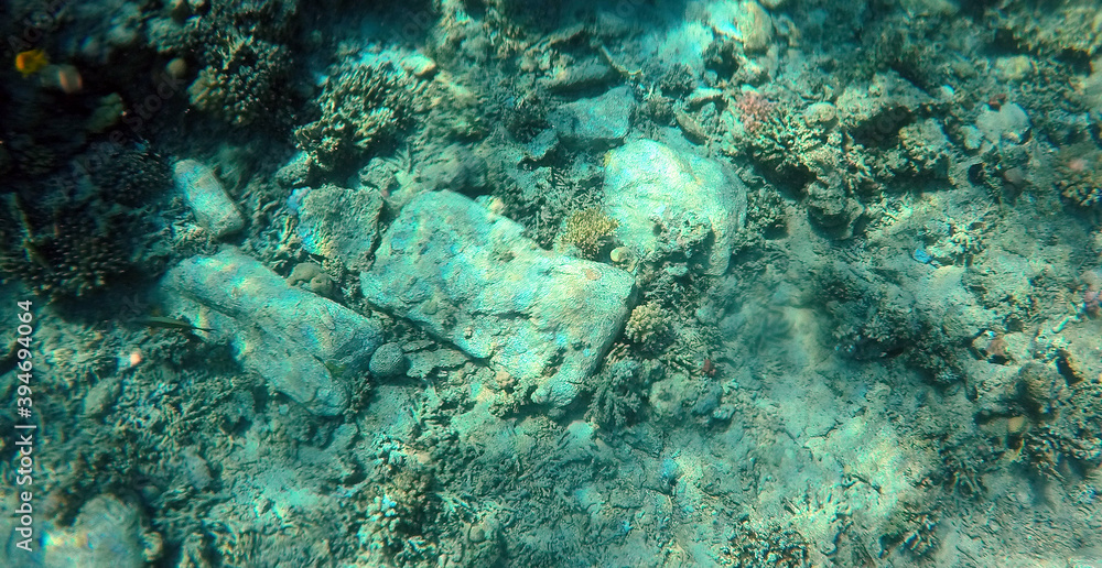 Fototapeta premium A mysterious jumble of limestone building blocks at the bottom of the Red Sea. Sharm El Sheikh, Egypt