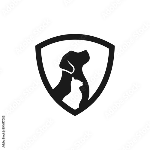 shield logo with dog and cat silhouette, pet clinic icon