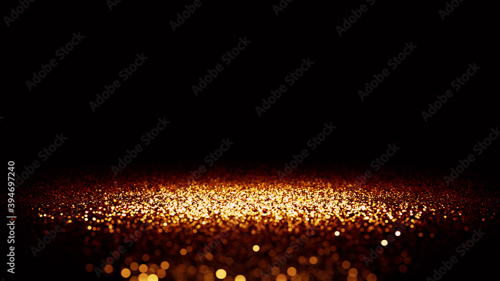 Fototapeta premium twinkling golden glitter lit by a bright spotlight, on a black background with depth of field effect