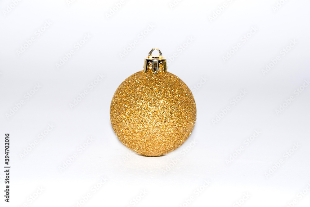 Christmas decor yellow ball on white background Christmas decor yellow ball on white background