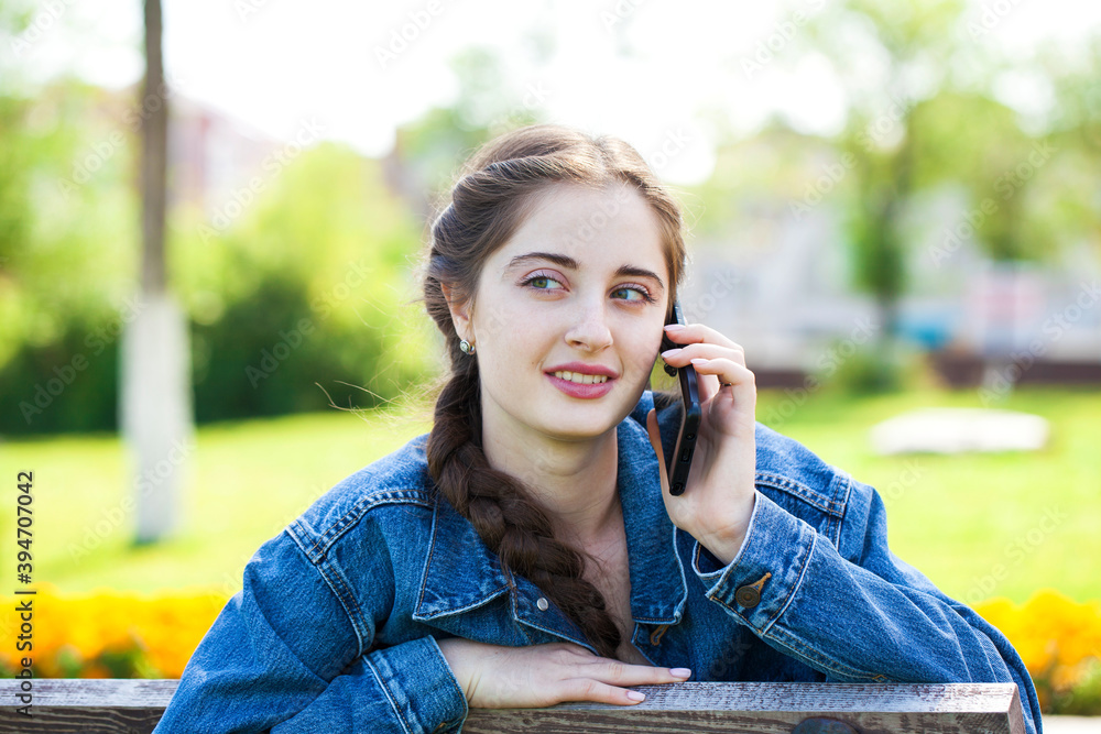 portrait of a young beautiful girl calling by phone portrait of a young beautiful girl calling by phone