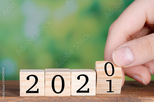 New year concept with wooden cube. 2021