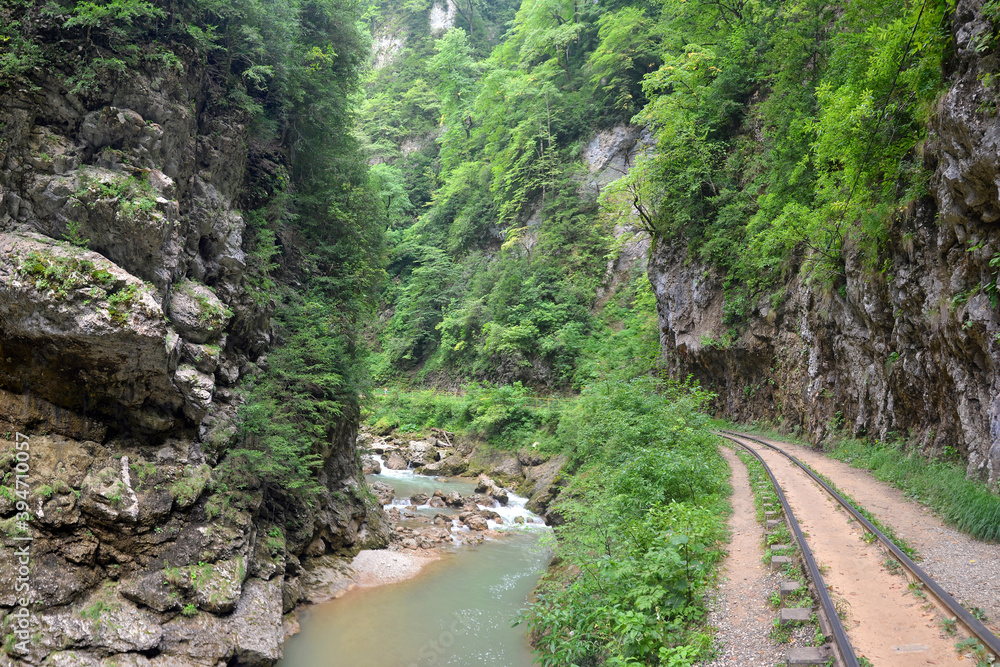 Old rail road in Guamskoye gorge. Krasnodar Krai, Caucasus, Russia. Old rail road in Guamskoye gorge. Krasnodar Krai, Caucasus, Russia.