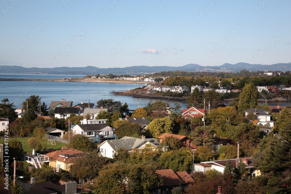 View of a small town with residential houses and harbor view at coast of Vancouver Island  near Victoria, British Columbia, Canada
