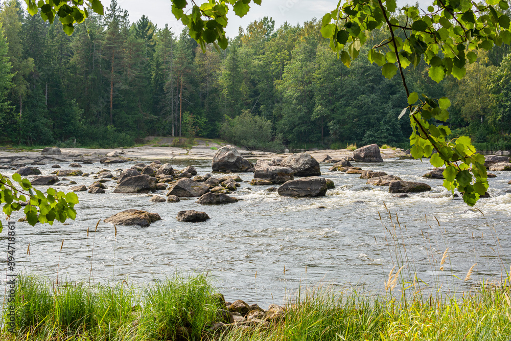 View of The Langinkoski rapids in summer, Kymi river, Kotka, Finland View of The Langinkoski rapids in summer, Kymi river, Kotka, Finland