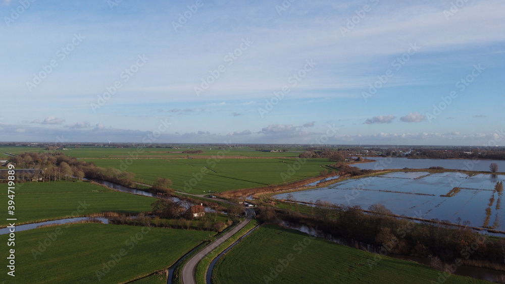 Naklejka premium Farmland around the lake Sneekermeer