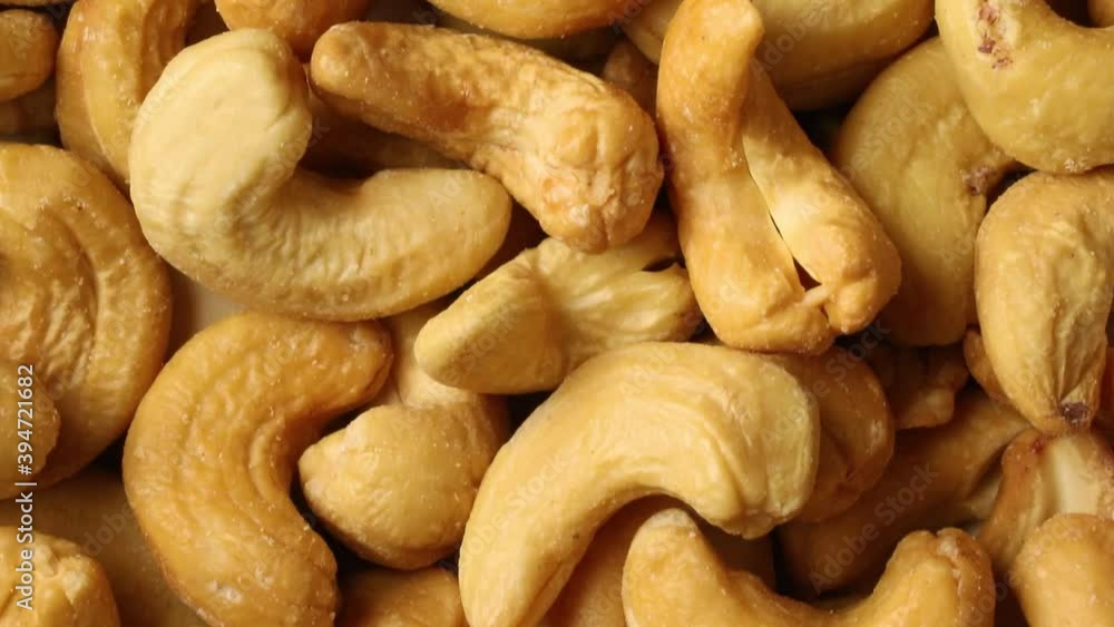 Peeled whole cashew nuts full frame close up Peeled whole cashew nuts full frame close up