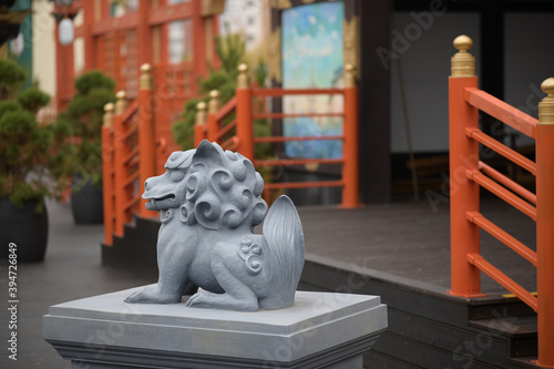 Traditional Japanese lion dragon sculpture in Kurkino park photo