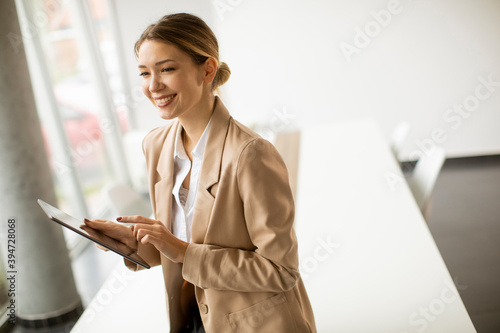 Happy woman manager holding...