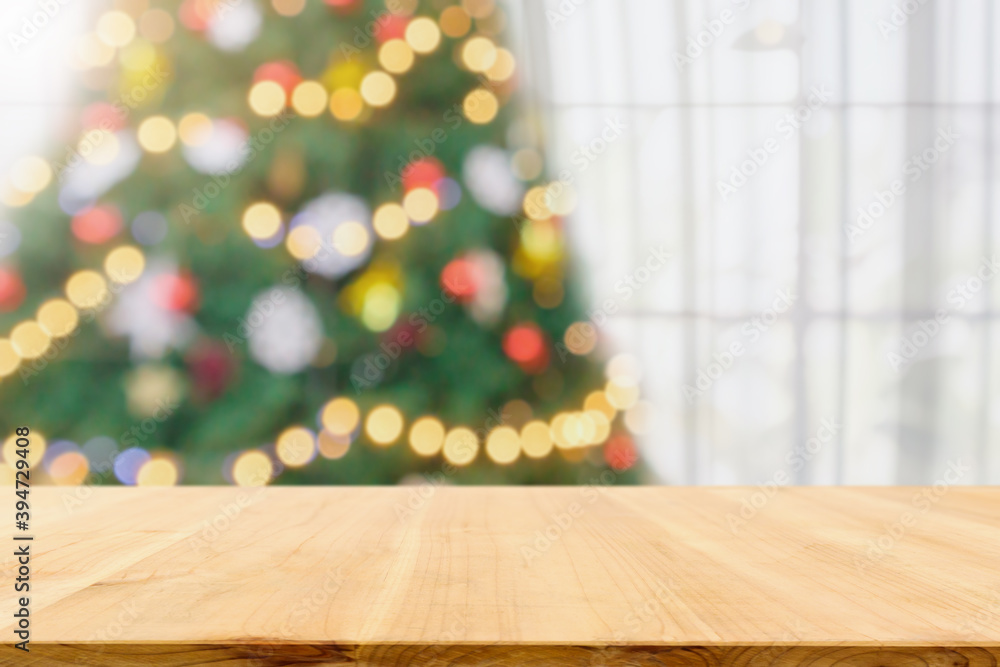 Empty table top with blurred Christmas tree with bokeh light background Empty table top with blurred Christmas tree with bokeh light background