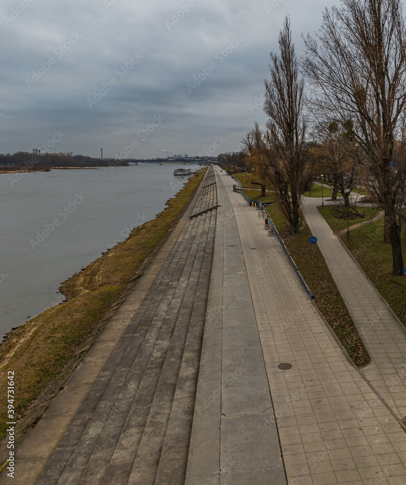 Cloudy cityscape with boulevards near the Vistula River