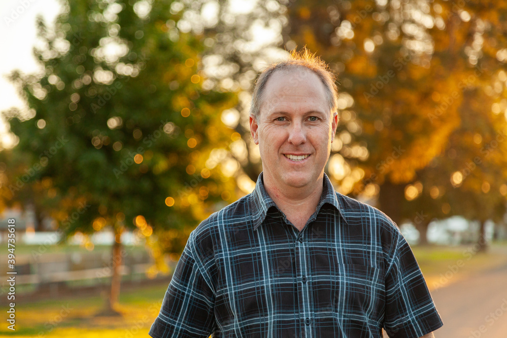 Portrait of middle aged man in natural golden light Portrait of middle aged man in natural golden light