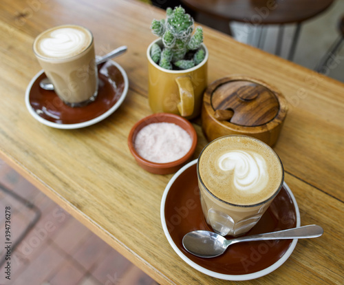Two coffees on a table in a cafe. photo