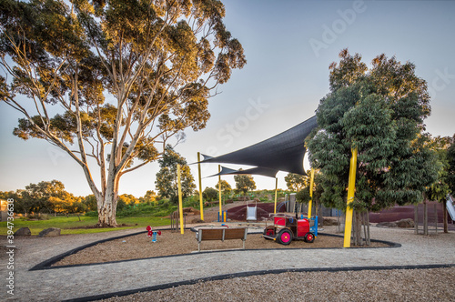 Playground with Large Gum Tree photo