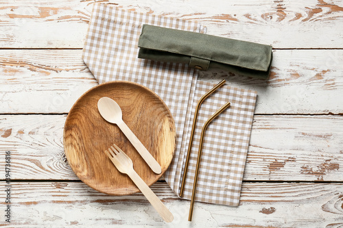 Eco tableware on white wooden background
