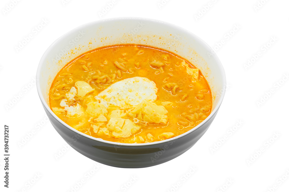 Egg and pork and chicken soup with noodles and vegetables in white bowl Egg and pork and chicken soup with noodles and vegetables in white bowl