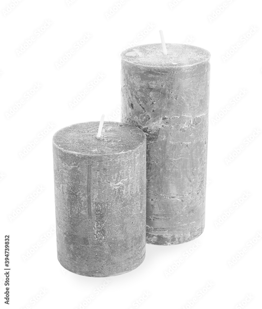 Wax candles on white background