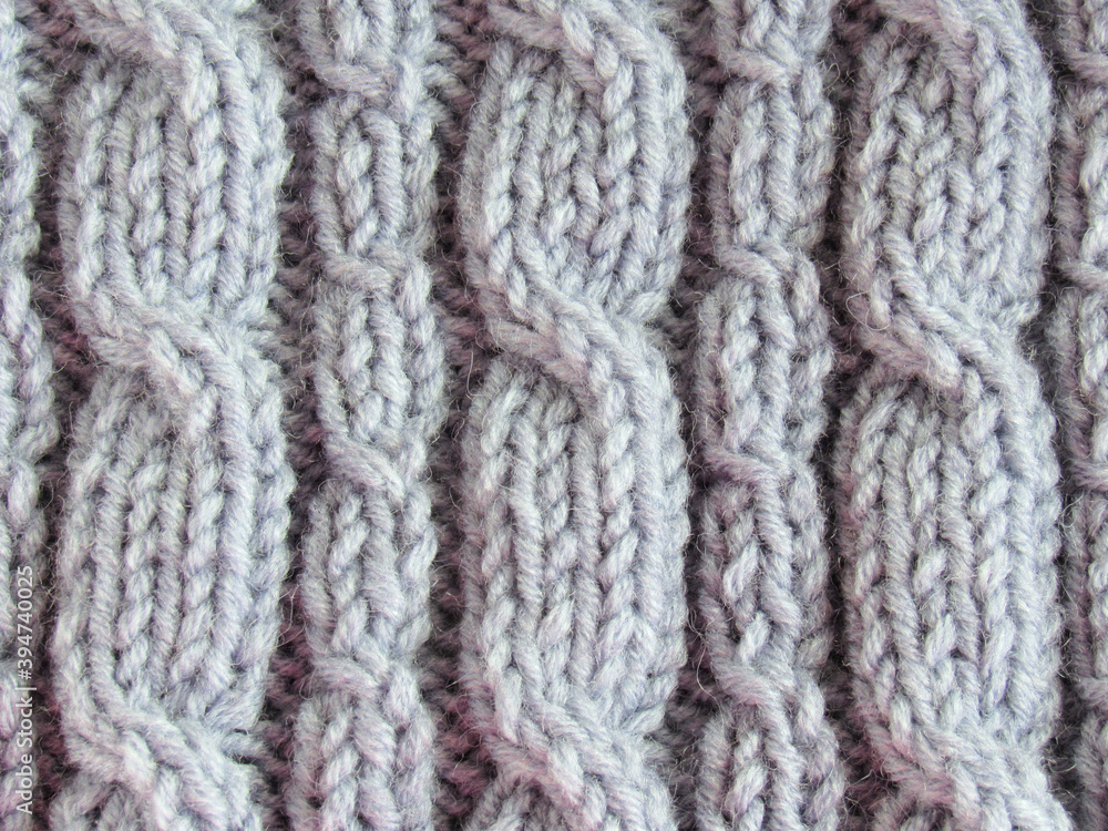 Handmade wool scarf close-up. Beautiful background.