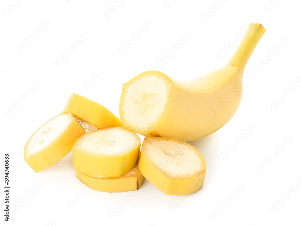 Cut ripe banana on white background